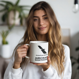 AA_-_American_Airlines_2013_ACM_Coffee_M_Model_Holding_LH_Mockup.png_15830479