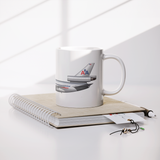 AA_DC10_Old_Livery_Coffee_Mug_-_11oz_Lifestyle_Notebook_Mockup.png