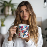 Airplane_Tail_Art_Collage_Coffee_Mug_Model_Holding_LH_Mockup.png