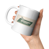Allegheny_-_Vintage_1954_Bag_Sticker_Cof_11oz_White_LH_Model_Mockup.png_15454918
