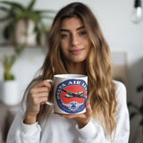 Delta_Air_Lines_1950s_Bag_Sticker_Light_Model_Holding_LH_Mockup.png_15623622