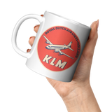 KLM_-_Orange_Vintage_Bag_Sticker_Coffee__11oz_White_LH_Model_Mockup.png