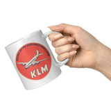 KLM_-_Orange_Vintage_Bag_Sticker_Coffee__11oz_White_RH_Model_Mockup.png