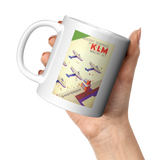 KLM_Vintage_Bezoekt_Schiphol_Travel_Post_11oz_White_LH_Model_Mockup.png_16316295