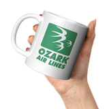Ozark_Green_Logo_Coffee_Mug_-_11oz_11oz_White_LH_Model_Mockup.png_15944476