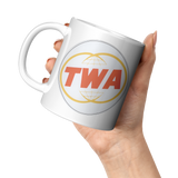 TWA_Trans_World_Airlines_Vintage_Bag_Sti_11oz_White_LH_Model_Mockup.png_16310919